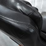 Fåtölj Ergonomisk Svart Brun Konstläder för Vardagsrum och Vila med Fotpall och Snurrbar Sits samt Justerbart Ryggstöd Robust Modell